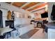 Cozy bedroom with wood ceiling and a TV at 2406 S Clark Ave, Tampa, FL 33629