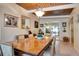 Formal dining room with a large table and wood floors at 2406 S Clark Ave, Tampa, FL 33629