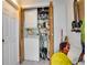 Stacked washer and dryer in closet at 2406 S Clark Ave, Tampa, FL 33629