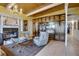 Living room with fireplace, built-ins and tiled floors at 2406 S Clark Ave, Tampa, FL 33629