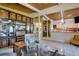 Open living area with kitchen views and built-in cabinets at 2406 S Clark Ave, Tampa, FL 33629
