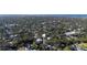 Aerial view showing home's location in a residential neighborhood near the water at 2406 S Clark Ave, Tampa, FL 33629
