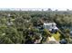 Aerial view of house, showcasing city skyline at 2406 S Clark Ave, Tampa, FL 33629