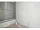 Bathroom with a bathtub and grey tile walls, still under construction at 476 43Rd N Ave, St Petersburg, FL 33703