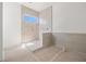 Large bathroom with walk-in shower and tile surround at 476 43Rd N Ave, St Petersburg, FL 33703