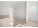 Bathroom under construction, featuring a large window and tile flooring at 476 43Rd N Ave, St Petersburg, FL 33703