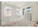 Spacious bedroom with large windows and unfinished flooring at 476 43Rd N Ave, St Petersburg, FL 33703