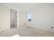 Well-lit bedroom with large closet and an open view to another room at 476 43Rd N Ave, St Petersburg, FL 33703