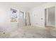 Large bedroom with unfinished floors and plenty of natural light at 476 43Rd N Ave, St Petersburg, FL 33703