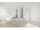 Unfinished bedroom with multiple doors and wood flooring at 476 43Rd N Ave, St Petersburg, FL 33703