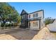 Two-story modern farmhouse with black and white exterior, under construction at 476 43Rd N Ave, St Petersburg, FL 33703