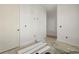 Unfinished hallway with doors to various rooms at 476 43Rd N Ave, St Petersburg, FL 33703