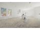 Open concept kitchen with island, recessed lighting, and unfinished flooring at 476 43Rd N Ave, St Petersburg, FL 33703