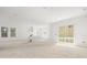 Open floor plan with kitchen island and sliding glass door at 476 43Rd N Ave, St Petersburg, FL 33703