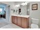Double vanity bathroom with a large mirror and separate shower at 5648 Sunset Falls Dr, Apollo Beach, FL 33572