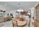 Open dining room features a wood table and kitchen views at 5648 Sunset Falls Dr, Apollo Beach, FL 33572