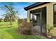 Covered screened patio with view of backyard at 5648 Sunset Falls Dr, Apollo Beach, FL 33572