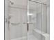 Large walk in shower with glass enclosure and seat at 5648 Sunset Falls Dr, Apollo Beach, FL 33572