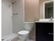 Bathroom with a tile shower, updated fixtures, and tile flooring at 7140 Orchid Lake Rd, New Port Richey, FL 34653