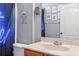 Clean bathroom with a vanity, toilet and shower/tub combo at 30552 Latourette Dr, Wesley Chapel, FL 33545