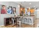 Kitchen with light wood cabinets, stainless steel appliances, and an island at 30552 Latourette Dr, Wesley Chapel, FL 33545