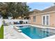 Relaxing pool area with spacious patio at 30552 Latourette Dr, Wesley Chapel, FL 33545