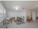 Bright living room with tiled floor, comfy seating, and workspace at 2960 59Th S St # 509, Gulfport, FL 33707