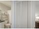 Clean bathroom with a toilet, sink, and shower at 2960 59Th S St # 509, Gulfport, FL 33707
