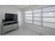 Bright living room with large windows and tiled floors at 2960 59Th S St # 509, Gulfport, FL 33707