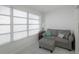Relaxing sunroom featuring a comfy couch and ample natural light at 2960 59Th S St # 509, Gulfport, FL 33707