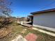 Features a wooden deck and a white building in the backyard at 620 Dalton Blvd, Port Charlotte, FL 33952