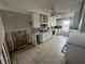 Kitchen with white cabinets and granite countertops, showing water damage at 620 Dalton Blvd, Port Charlotte, FL 33952