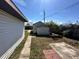 Backyard with shed, walkway, and patio at 620 Dalton Blvd, Port Charlotte, FL 33952