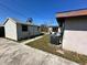Backyard with shed and concrete patio area at 620 Dalton Blvd, Port Charlotte, FL 33952