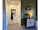 Inviting entryway with coat rack and storage cabinet at 10263 Gandy N Blvd # 2114, St Petersburg, FL 33702