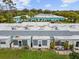 Aerial view of building exteriors and rooftops at 4215 Prince Pl # 4215, New Port Richey, FL 34652