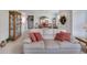 Living room with comfortable seating and a view into the dining room and kitchen at 5648 Sunset Falls Dr, Apollo Beach, FL 33572