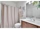 Bathroom with tub shower combination and vanity at 5648 Sunset Falls Dr, Apollo Beach, FL 33572