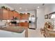 Spacious kitchen with stainless steel appliances and granite countertops at 5648 Sunset Falls Dr, Apollo Beach, FL 33572