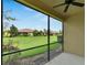 Relaxing screened porch overlooking the backyard at 5648 Sunset Falls Dr, Apollo Beach, FL 33572