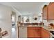 Kitchen features a large island, stainless steel appliances, and ample cabinet space at 5648 Sunset Falls Dr, Apollo Beach, FL 33572