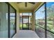 Private screened porch with backyard access at 5648 Sunset Falls Dr, Apollo Beach, FL 33572