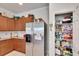 Well-organized kitchen pantry with ample shelving at 5648 Sunset Falls Dr, Apollo Beach, FL 33572