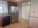 Stainless steel refrigerator and dishwasher in kitchen at 19111 Vista Bay Dr # 308, Indian Shores, FL 33785