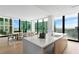 Open concept kitchen with island and city views at 1000 Water St # 1402, Tampa, FL 33602