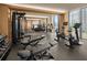 Modern fitness center with various exercise equipment and city views at 1000 Water St # 1402, Tampa, FL 33602