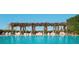 Resort-style pool with lush floral decor and comfortable seating at 1000 Water St # 1402, Tampa, FL 33602