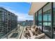 Spacious balcony with city views and comfortable outdoor furniture at 1000 Water St # 1402, Tampa, FL 33602
