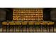 Dark and sophisticated bar with a marble counter and yellow barstools at 1000 Water St # 1402, Tampa, FL 33602