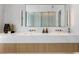 Double vanity bathroom with marble countertop and modern fixtures at 1000 Water St # 1402, Tampa, FL 33602